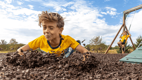 Rubber Mulch or Wood Mulch - What is the Best Material For Your Swing Set's Base? - River City Play Systems