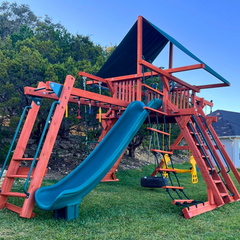 Very tall playset with monkey bars.